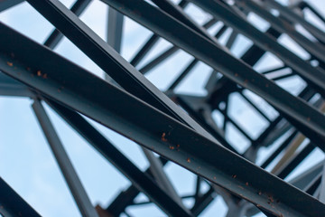 Abstract background. Blurred iron construction. A lot of crossbars.