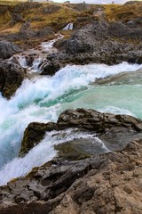 Godafoss waterfall in Iceland with beautiful autumn colors