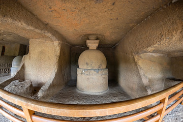 God budha hand made scriptures on walls in historic and centuries old kanheri caves in mumbai India