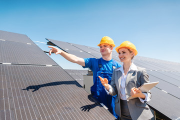 Worker and investor in solar power plant