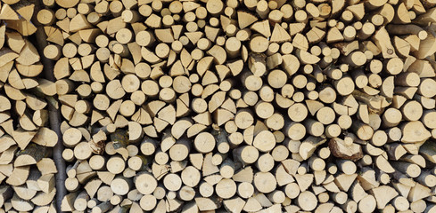 Firewood background texture, after the sawing wood