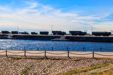 Military vehicles at a pier in Kronstadt, Russia