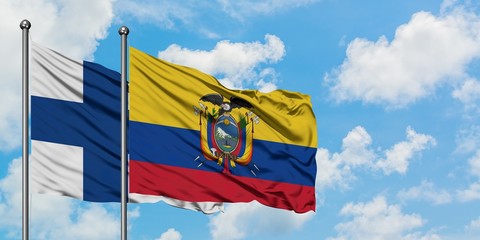Finland and Ecuador flag waving in the wind against white cloudy blue sky together. Diplomacy concept, international relations.