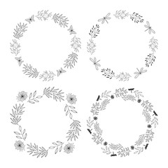 Set of elegant hand drawn floral wreaths. Circle wedding frames. Round vintage borders. Vector isolated illustration.
