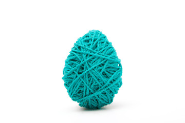 Blue decorated easter eggs from wool yarn. Happy Easter.
