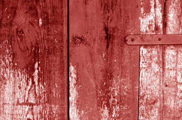 Grungy wooden planks background in red color.
