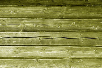 Fototapeta premium Old grungy wooden planks background in yellow color.