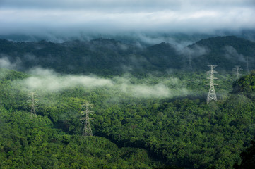 Electric transmission towers in fog