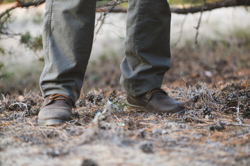 Feet of tourist man casual boots look