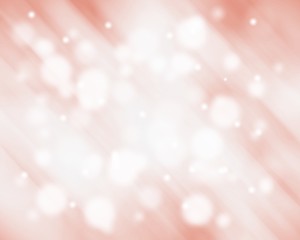 Red abstract winter background with bokeh snowflakes blurred for Christmas new year