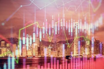 Multi exposure of forex chart drawings over cityscape background. Concept of success.