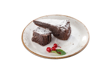 slice of brownie cake with cherry isolated on white background