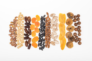 top view of assorted turkish dried fruits and nuts isolated on white