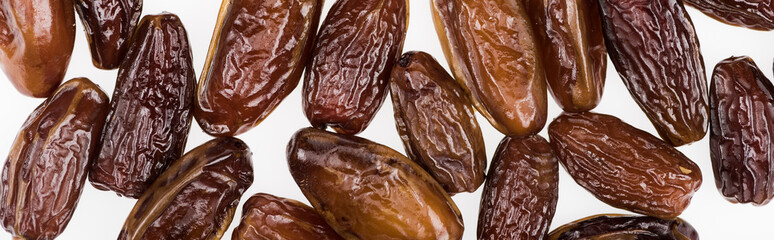 top view of tasty dried dates isolated on white, panoramic shot