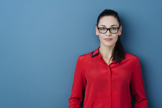 Serious Young Woman Wearing Glasses