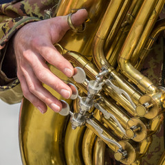 hands playing trombone
