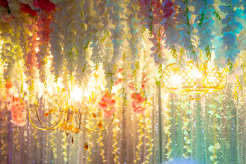 Hand made paper flower and decorative lighting, Wedding decoration stage in Bangladesh.