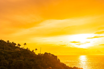 Beautiful outdoor tropical beach sea around samui island with coconut palm tree and other at sunset time