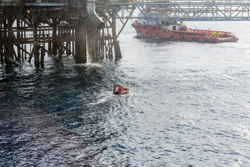 Fast rescue craft deployed at oil field to assist in achor handling activities