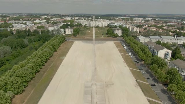 Beautiful symmetrical white square of the city of Cergy-Pontoise with a modern architectural composition of twelve columns de Saint-Christophe, Ile de France. Aerial shot