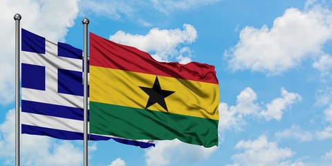 Greece and Ghana flag waving in the wind against white cloudy blue sky together. Diplomacy concept, international relations.