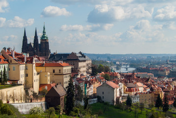 Fototapeta na wymiar Sunny morning view to Prague city, Saint Vitus cathedral and Vltava river