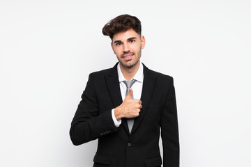 Young businessman over isolated white background giving a thumbs up gesture