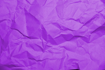 Сrumpled paper texture purple. Texture of crumpled paper. Crumpled paper. Wrinkles paper.
