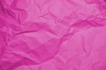 Fototapeta premium Crumpled recycle pink paper background - Pink paper crumpled texture - Pink paper wrinkled background.