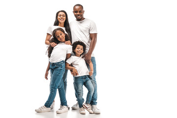 happy african american parents with daughter and son smiling at camera while standing on white background - Powered by Adobe