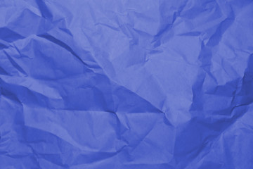 Blue crumpled paper texture background.