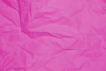 Crumpled recycle pink paper background - Pink paper crumpled texture - Pink paper wrinkled background.
