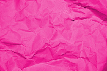 Fototapeta premium Crumpled recycle pink paper background - Pink paper crumpled texture - Pink paper wrinkled background.