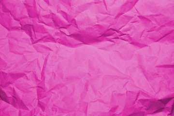 Fototapeta premium Crumpled recycle pink paper background - Pink paper crumpled texture - Pink paper wrinkled background.
