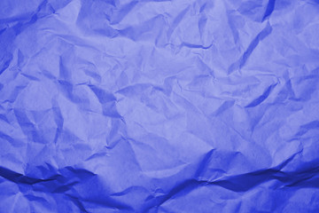 Blue crumpled paper texture background.
