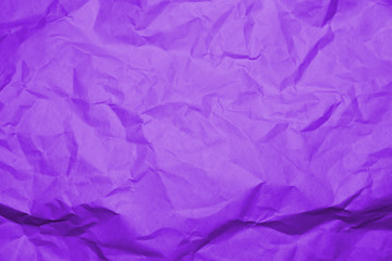 Сrumpled paper texture purple. Texture of crumpled paper. Crumpled paper. Wrinkles paper.