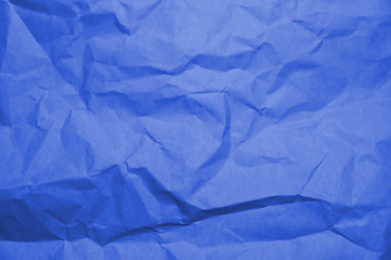 Fototapeta premium Blue crumpled paper texture background.