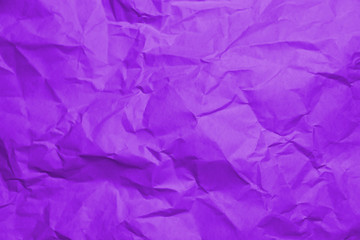 Сrumpled paper texture purple. Texture of crumpled paper. Crumpled paper. Wrinkles paper.