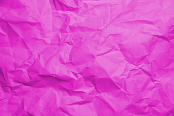 Fototapeta premium Crumpled recycle pink paper background - Pink paper crumpled texture - Pink paper wrinkled background.