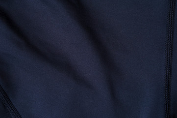 Close-up fragment of black nylon garment