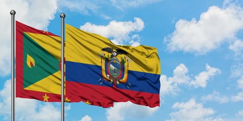 Grenada and Ecuador flag waving in the wind against white cloudy blue sky together. Diplomacy concept, international relations.