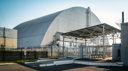 Fototapeta na wymiar nuclear power plant with a new dome in Chernobyl