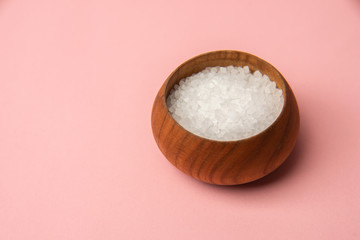 salt in bowl on wooden table