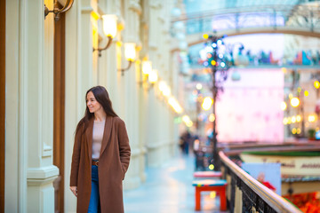 Beautiful woman on shopping in mall indoors