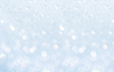 Winter christmas sparkling shiny silver bright glittering abstract bokeh background