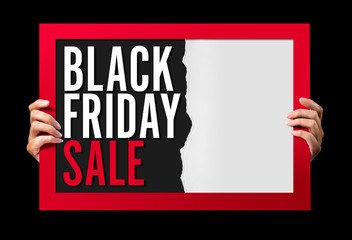Black friday sale inscription background. Woman holding a sale poster.