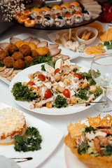 Delicious European and Slavic cuisine on the big table waiting for guests. Table with food, top view. Dinner. Catering food concept. Table full of homemade food  on a party event celebration