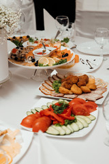 Delicious European and Slavic cuisine on the big table waiting for guests. Table with food, top view. Dinner. Catering food concept. Table full of homemade food  on a party event celebration