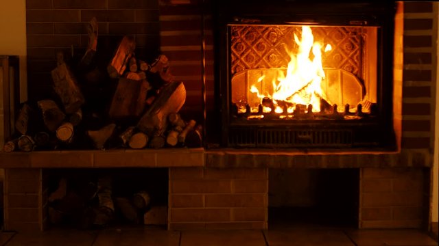 Burning fireplace. Background for the design of New Year's greetings. Christmas.	