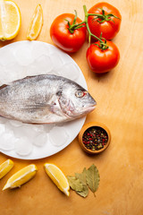 girl cooks dorado fish